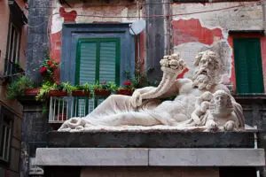 Statue of the God Nilo in Spaccanapoli historic center, Naples, Italy