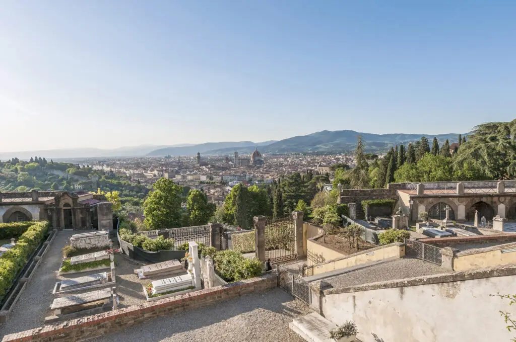 Panoramic view of Florence from San Miniato al Monte cemetery with Duomo and Tuscan hills in Italy