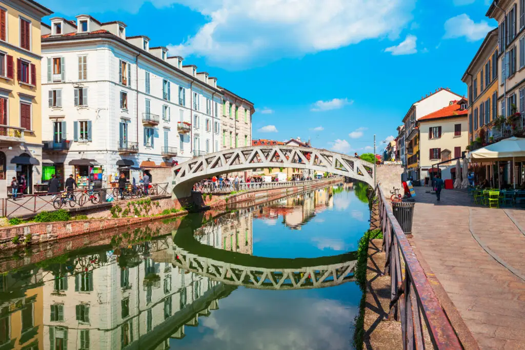 Naviglio Grande canal with historic bridge and colorful buildings in Milan, Lombardy, Italy