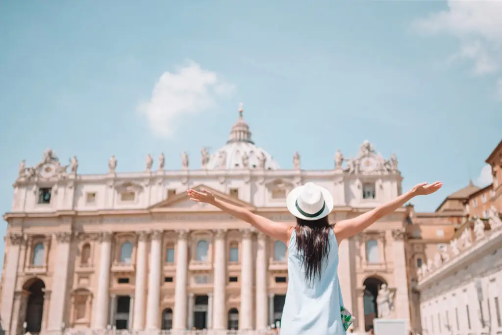 Young woman visiting St. Peter’s Basilica in Vatican City on a private Italy tour