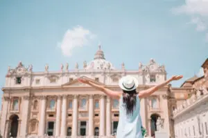 Young woman visiting St. Peter’s Basilica in Vatican City on a private Italy tour