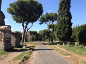 Tomb of Hilarus Fuscus on the Appian Way in Rome, Italy, with ancient Roman ruins and umbrella pines