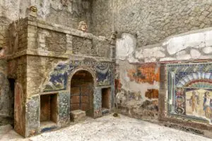Ancient Roman mosaics inside Herculaneum ruins near Naples, Italy, destroyed by Mount Vesuvius eruption