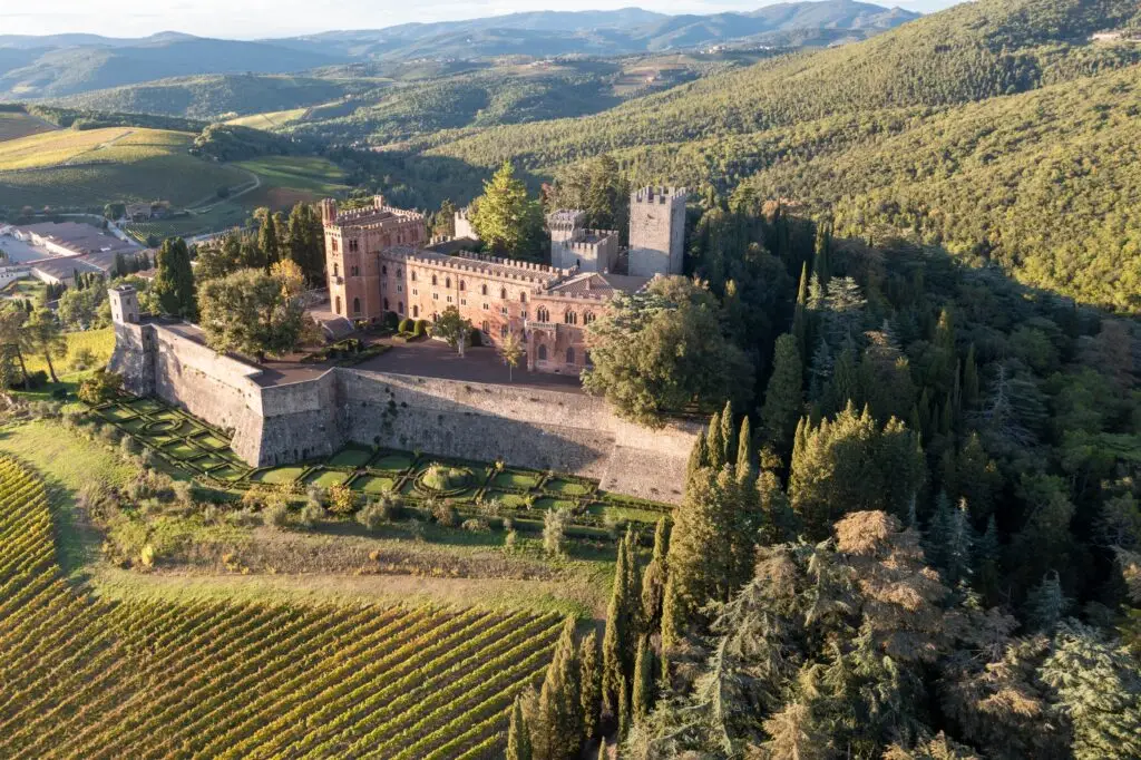 Aerial view of Castello di Brolio at Ricasoli Winery surrounded by Chianti vineyards in Tuscany, Italy