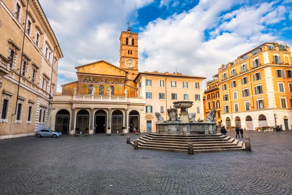Piazza di Santa Maria in Trastevere with basilica and fountain in Rome, Italy
