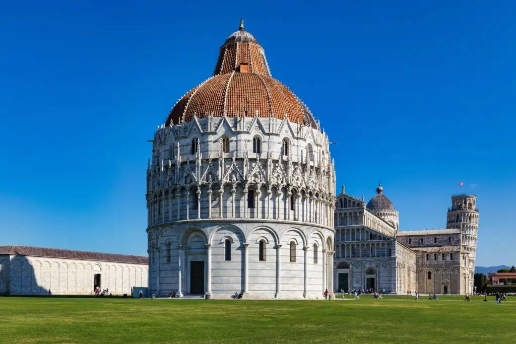 Pisa Baptistery, Cathedral and Leaning Tower in Piazza dei Miracoli on a sunny day in Italy