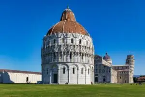 Pisa Baptistery, Cathedral and Leaning Tower in Piazza dei Miracoli on a sunny day in Italy
