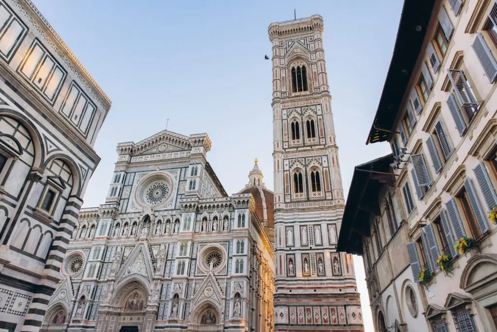 Florence Cathedral complex with Duomo facade and Giotto’s Bell Tower in Florence, Italy