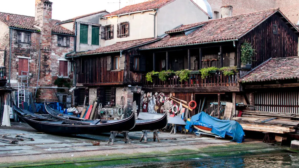 Squero di San Trovaso historic gondola boatyard in Venice, Italy, with traditional gondolas and wooden workshop buildings